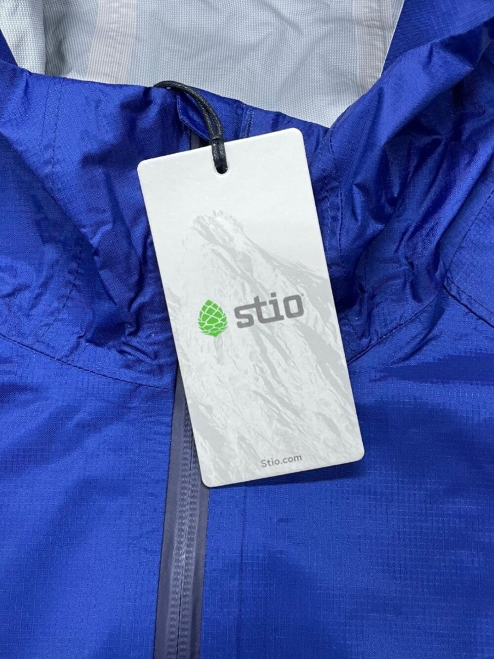 STIO Rollick Hooded Jacket Womens Medium Cobalt Night Blue Rain Shell 100363-401 - Picture 6 of 9